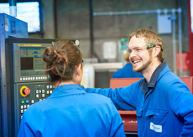 employees-talking-whilst-working